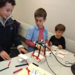 Children building their own LEGOscope at the Imperial Festival 2018