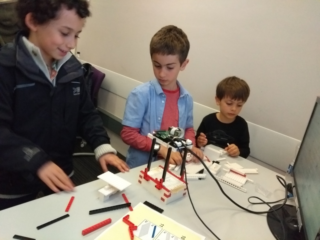Children building their own LEGOscope at the Imperial Festival 2018